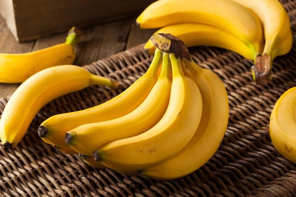 A Bunch of Bananas on a Wicker Surface