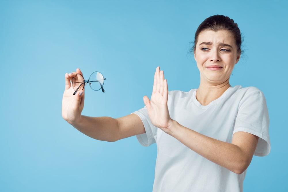 Woman Neglecting Glasses After Learning on How to Improve Your Eye Vision