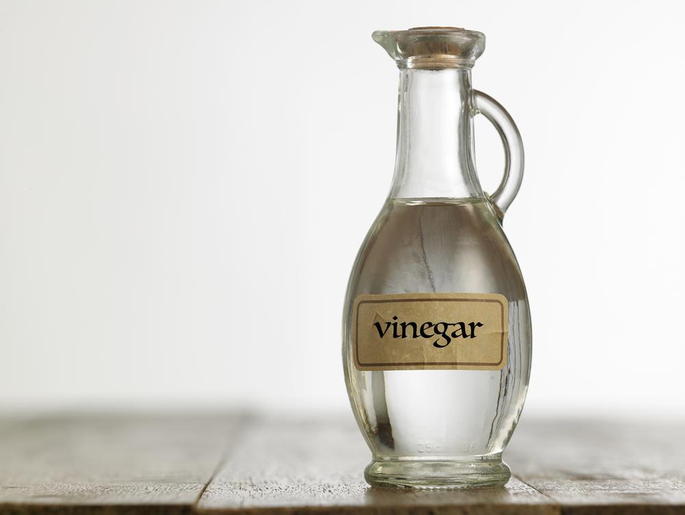 A glass bottle of vinegar