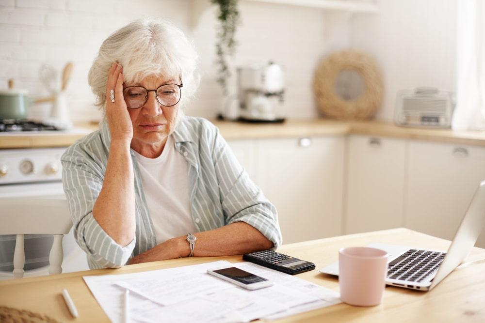 An elderly woman experiencing stress