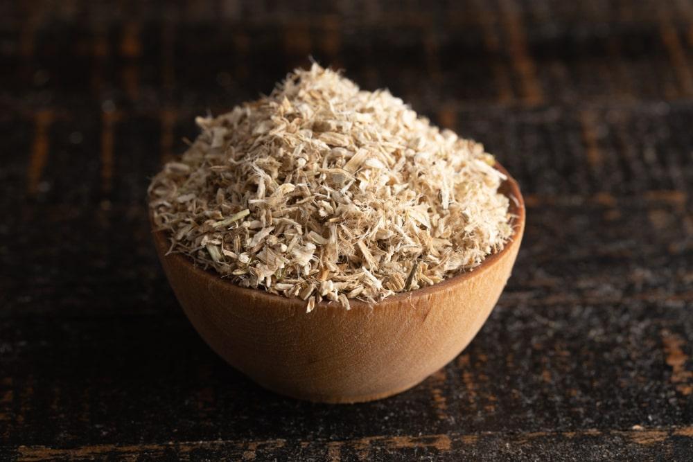 Dried Marshmallow Root Herb in a Wooden Bowl