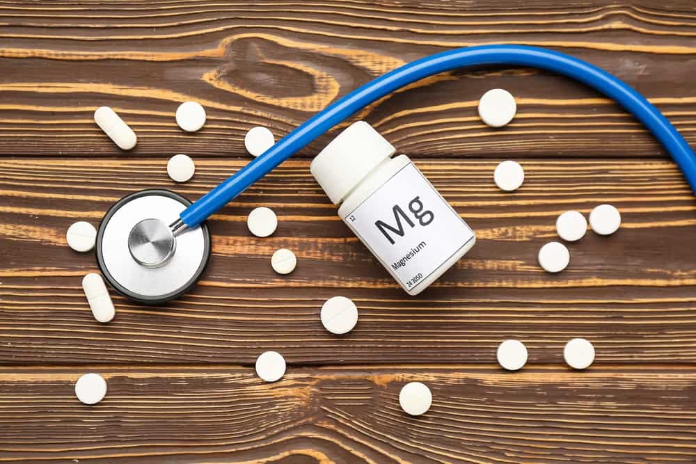 A Stethoscope and Magnesium Pills on a Table