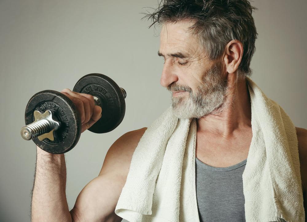 Man Over 40 Lifting a Dumbbell