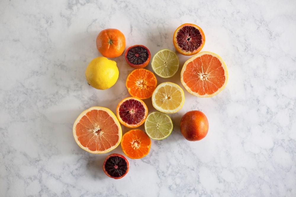 Citrus Fruits like green lemon, orange, mandarin orange, grapefruit