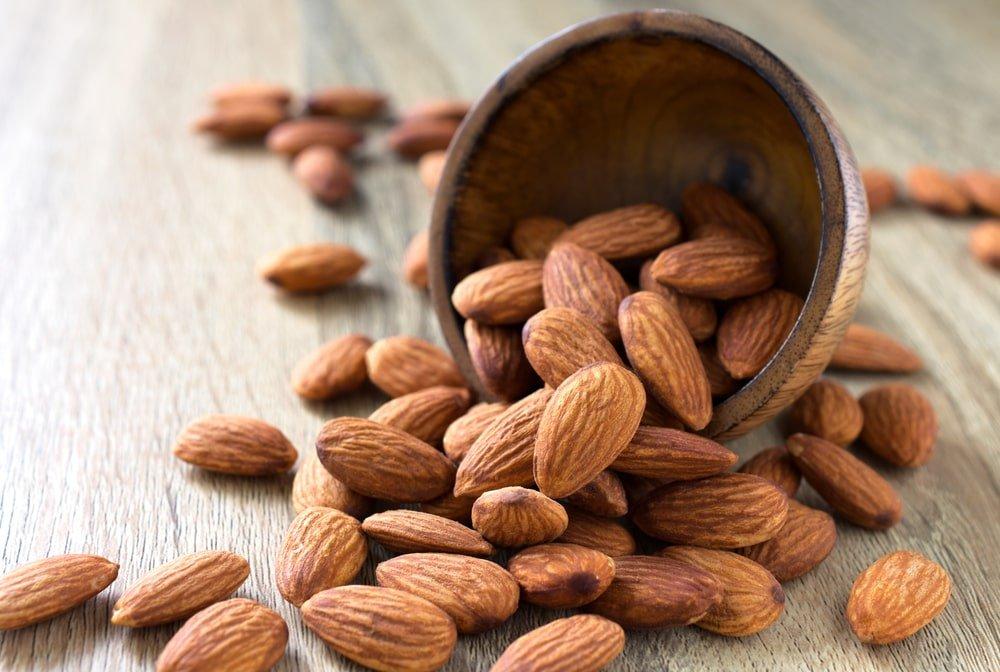Almonds on Wooden Background