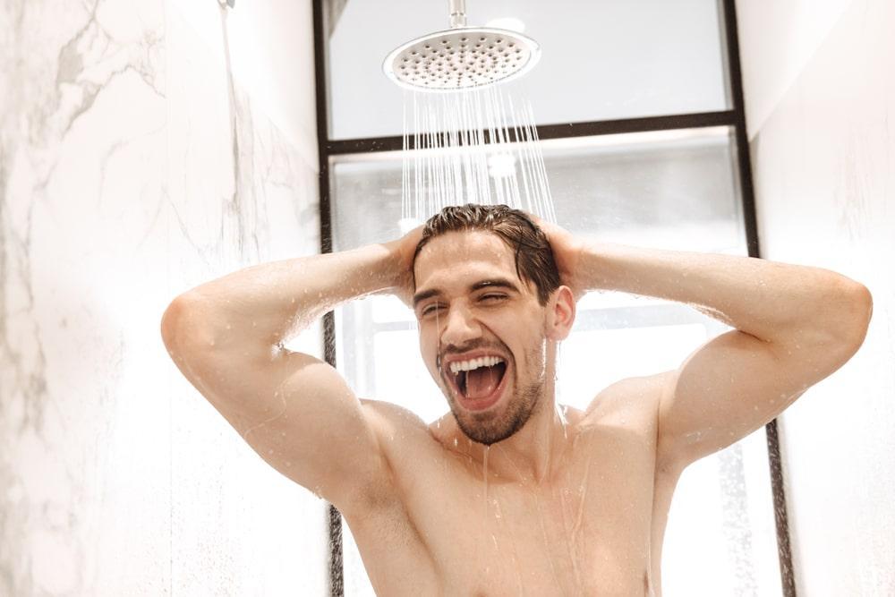 Happy Man Having a Shower