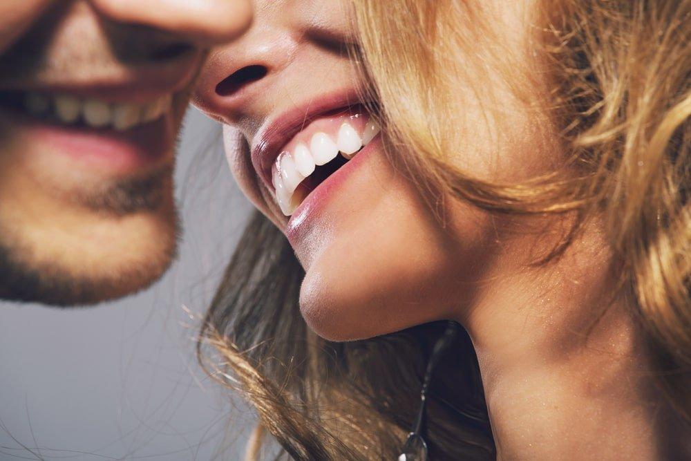 Close Up of a Man’s and Woman’s Mouths Expressing Happiness
