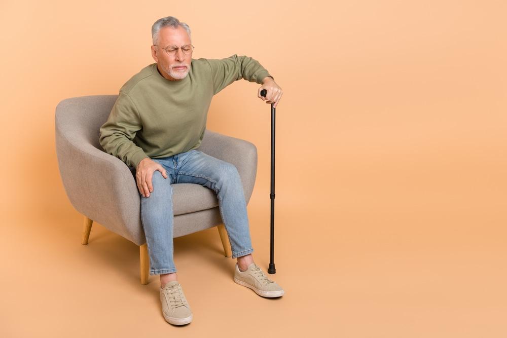 Senior Man Experiencing Cracking Knees