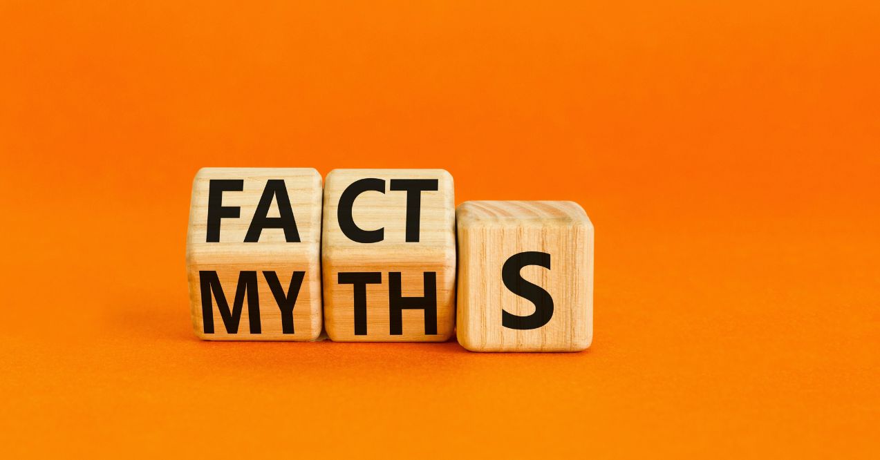 Facts or myths symbol. Concept word Myths and Facts. Beautiful orange table orange background. Business and facts or myths fact myth concept