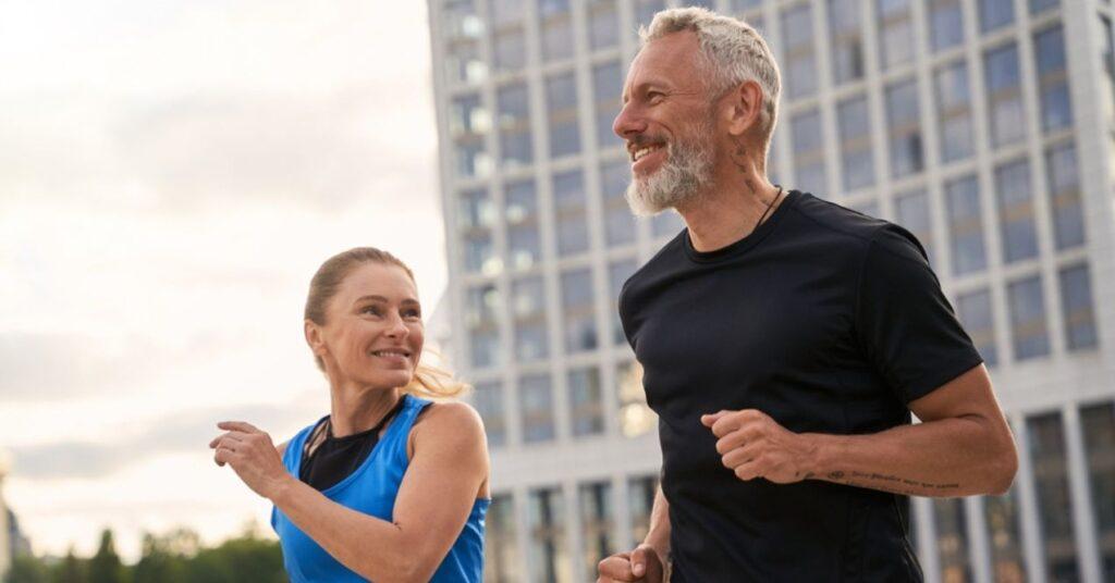 Active Middle Aged Couple Jogging Together