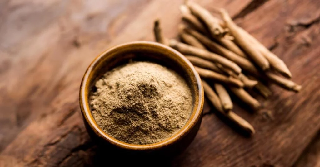 Bowl of Grinded Ashwagandha Next to Ashwagandha Sticks