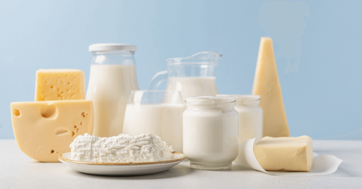 A Glass Jar of Yoghurt, Kefir Grains, Cheese and Butter