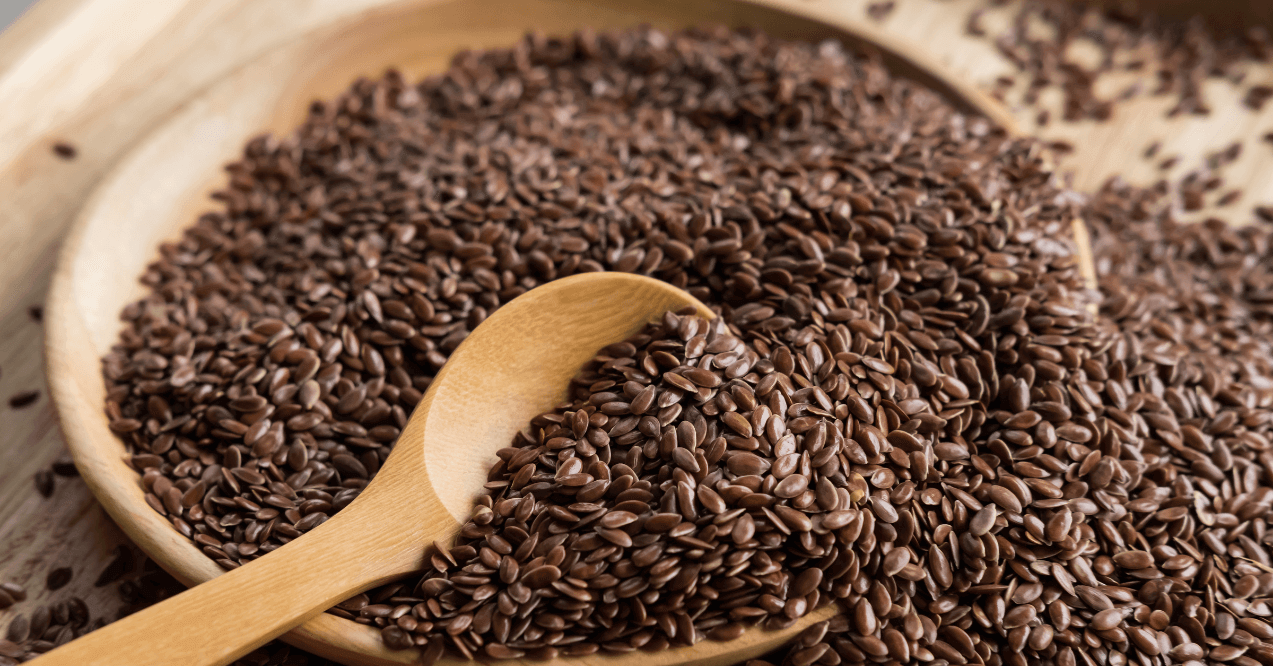 A Wooden Spoon in a Bowl of Flax Seeds