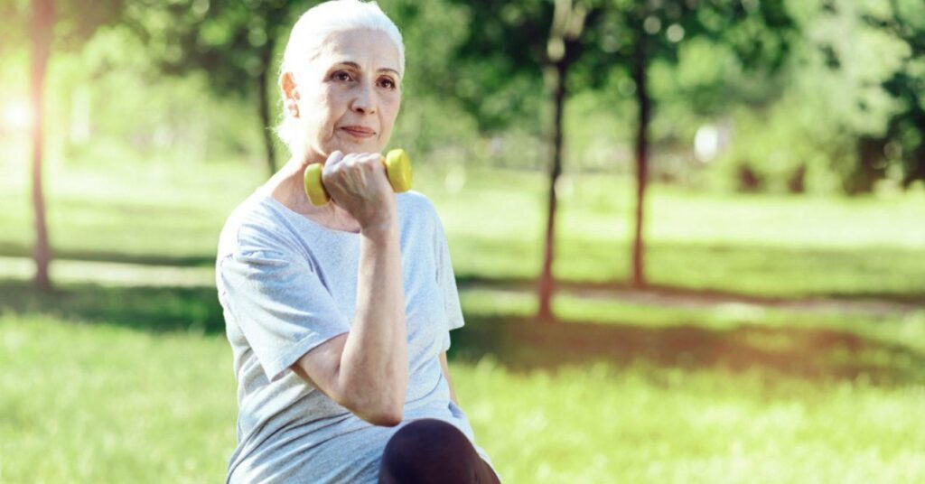 Dedicated Enthusiastic Pensioner Doing Her Regular Exercises