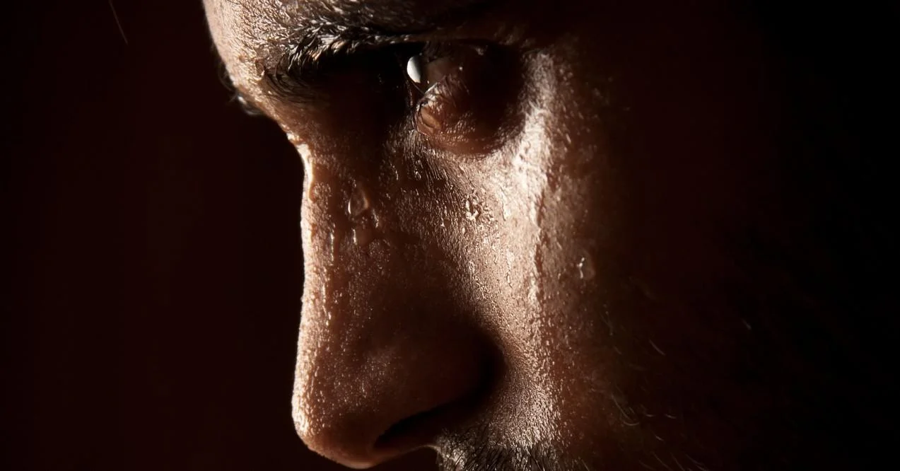 Heavily Sweating Man Due to a Fast Metabolism