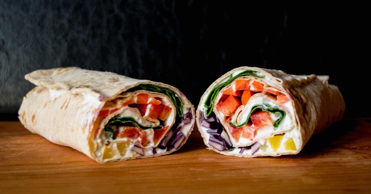 Rainbow Veggie Wraps on wooden board detox wrap