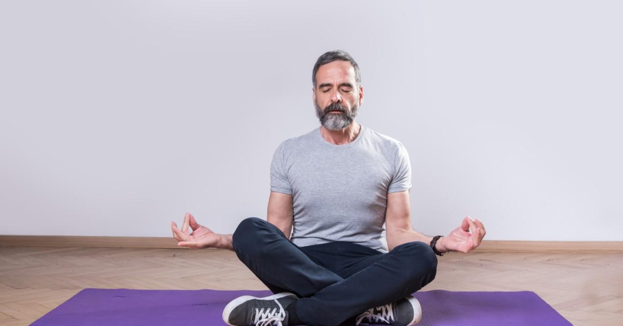 Senior Mature Man Practicing Yoga