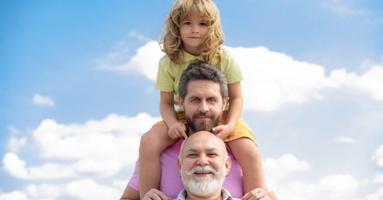 Portrait of Men Generation Grandfather Father and Grand Son Outdoor on Sky