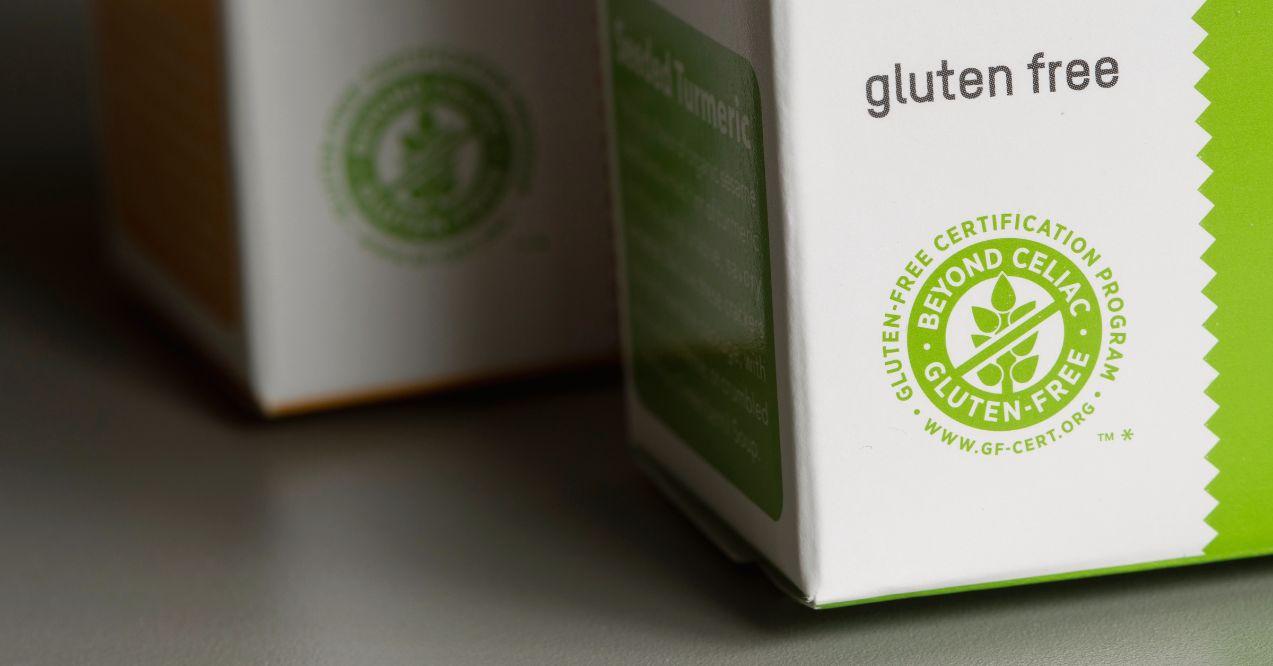 Closeup of the  Gluten-Free certification symbols seen on a box.