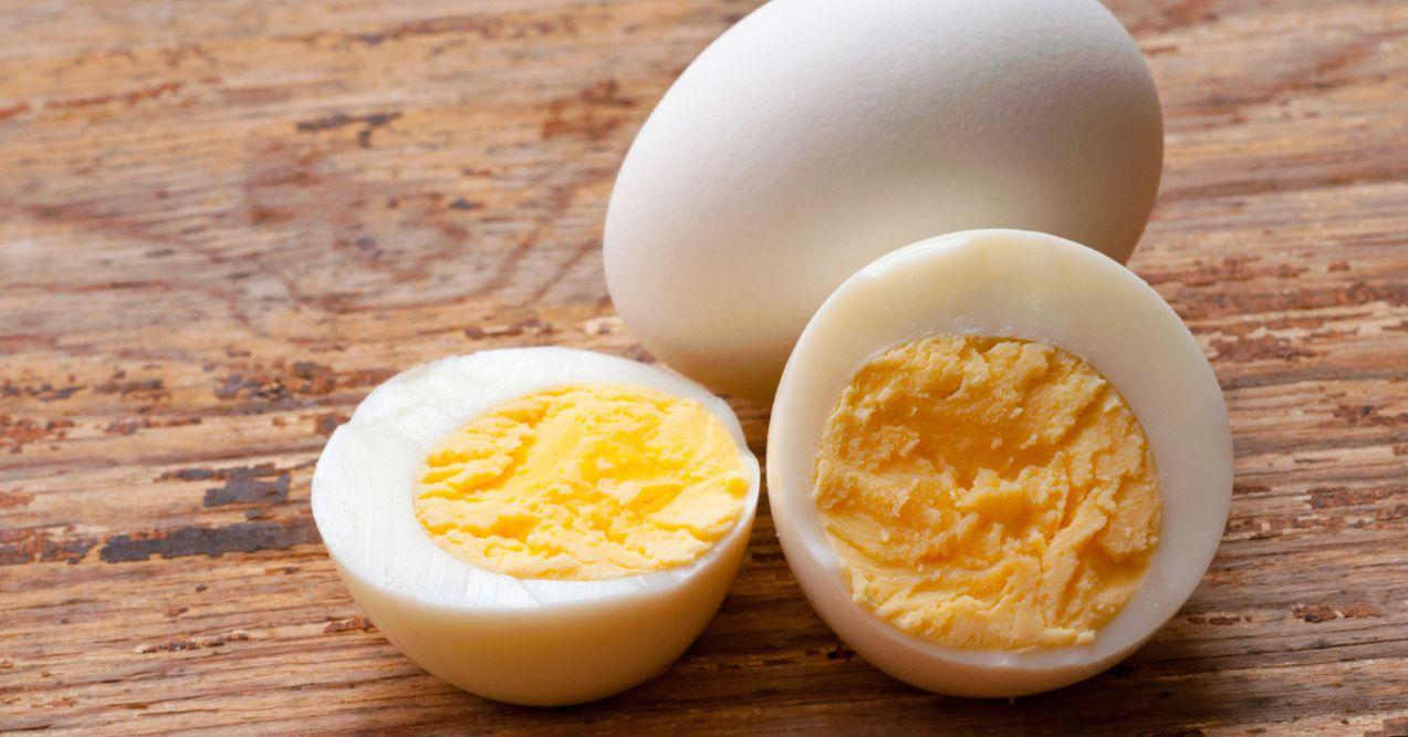 Hard boiled eggs on a wooden background