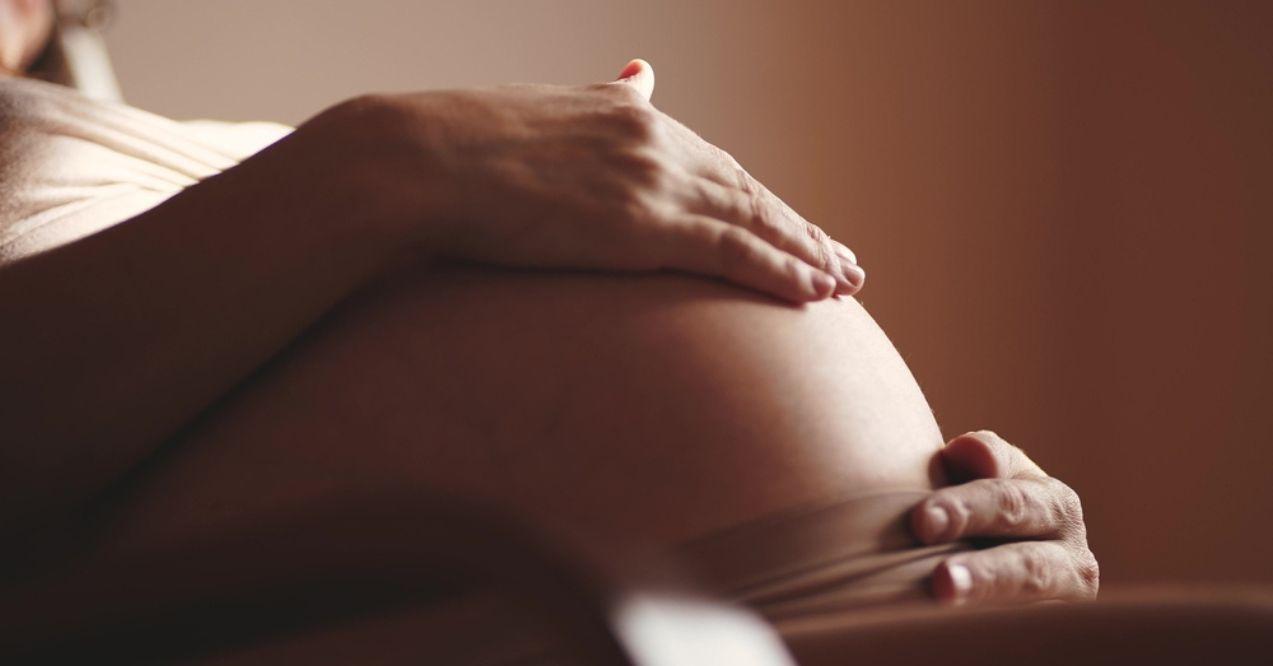 Close-up belly of a pregnant woman