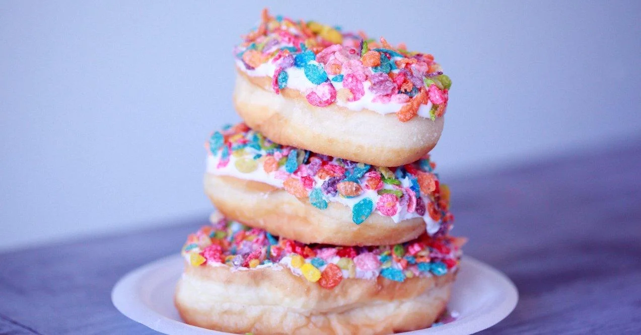 Three doughnuts stacked on top of each other