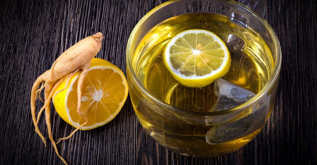 Ginseng tea on a wooden background