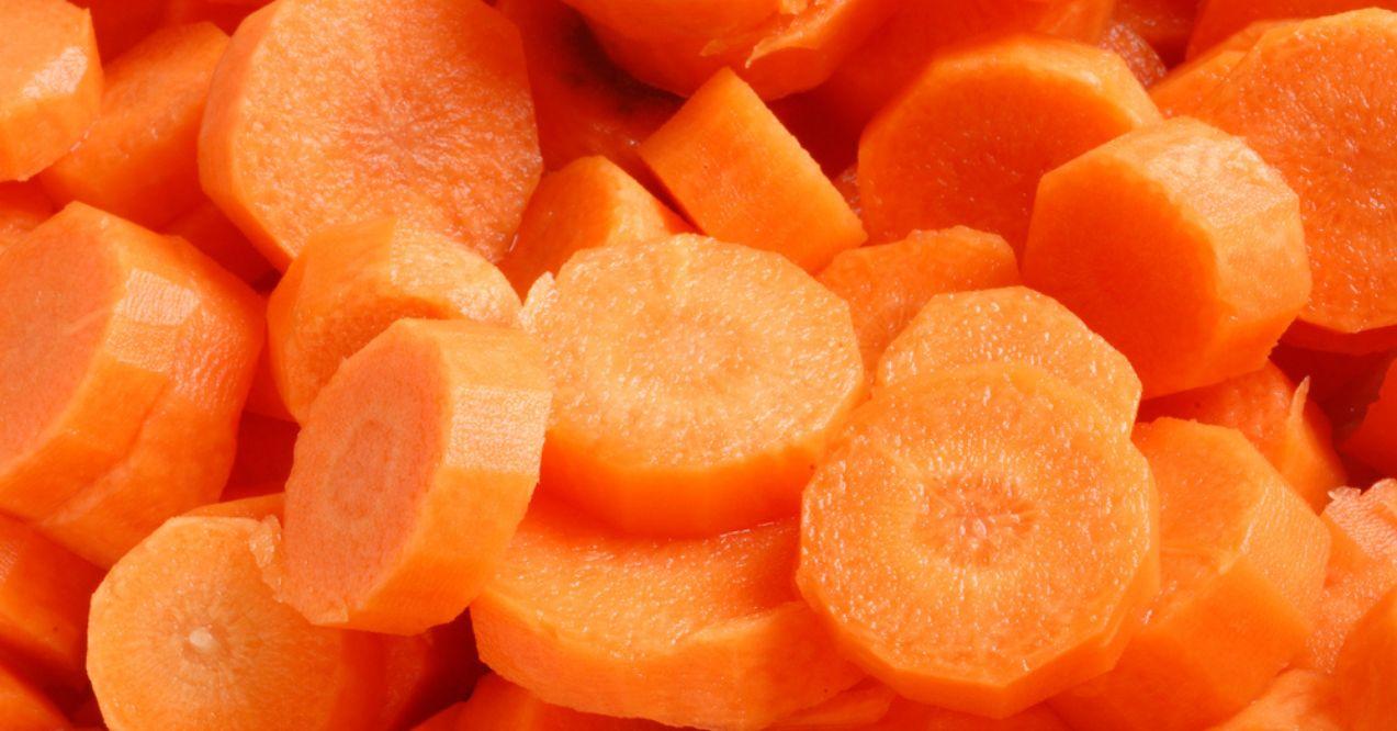 A background of sliced carrots