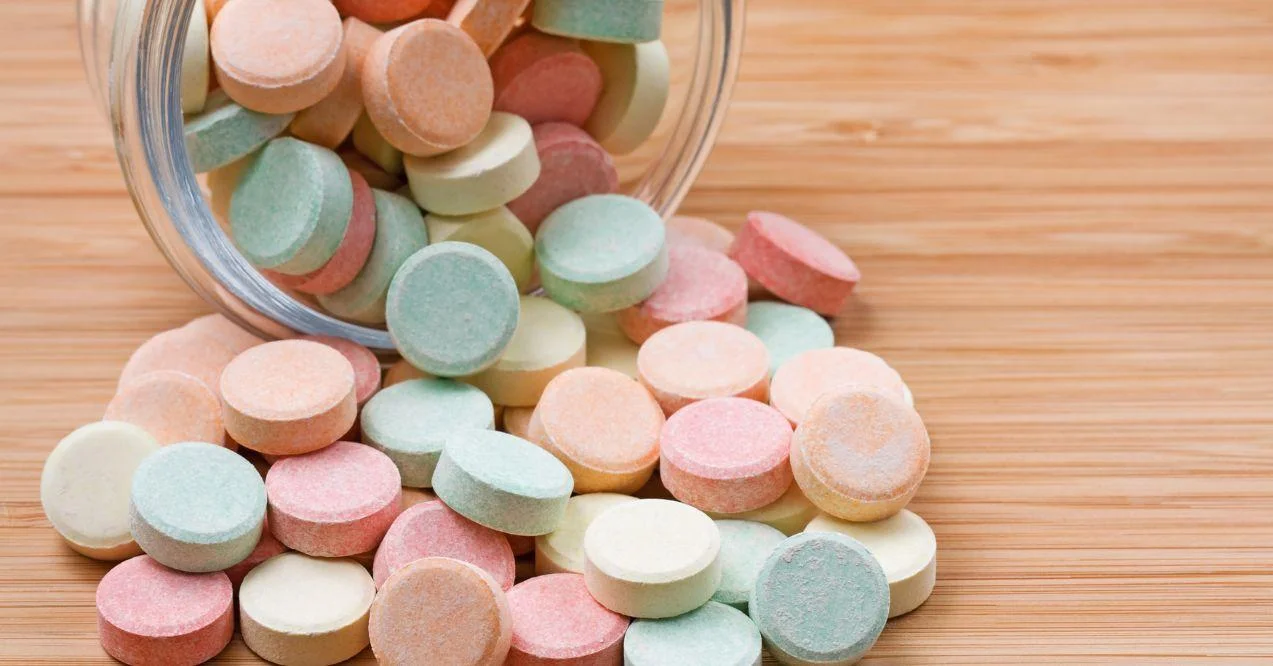 antacids spilled on a table