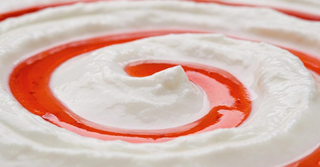 Close up of yogurt with fruit jam