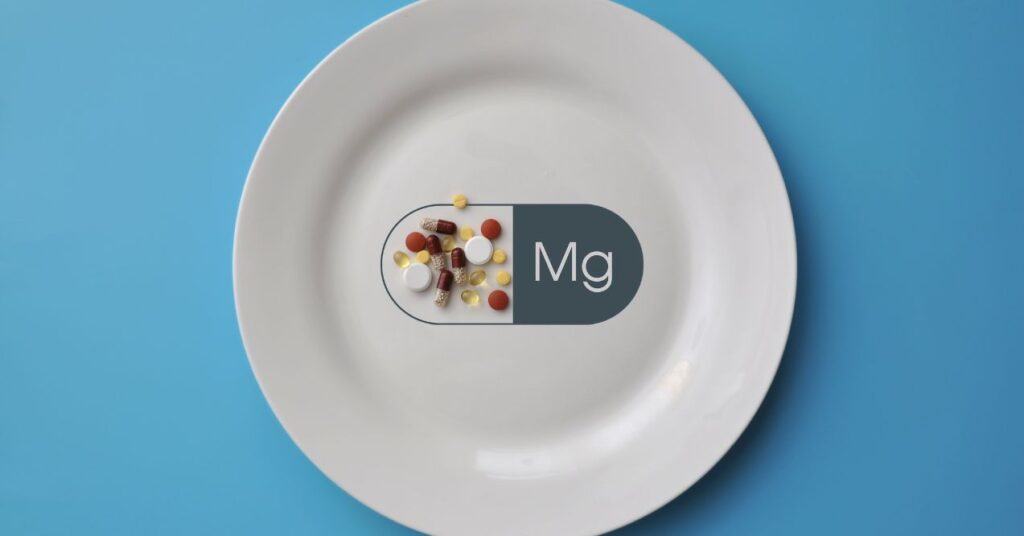 Magnesium mineral supplements on a white plate.