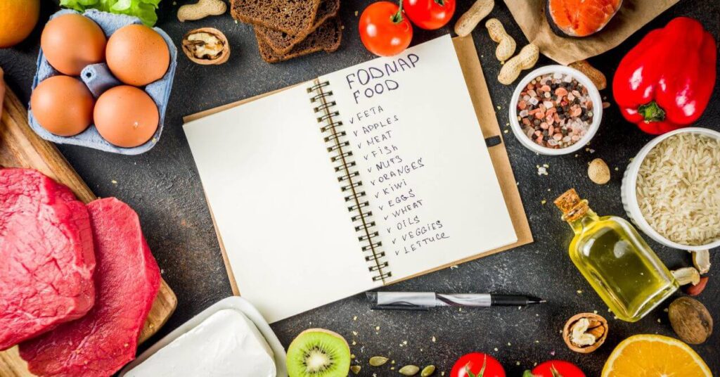 A handwritten list of FODMAP-friendly foods surrounded by ingredients.