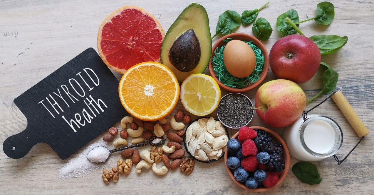 Fresh fruits, nuts, seeds, and eggs promoting thyroid health.