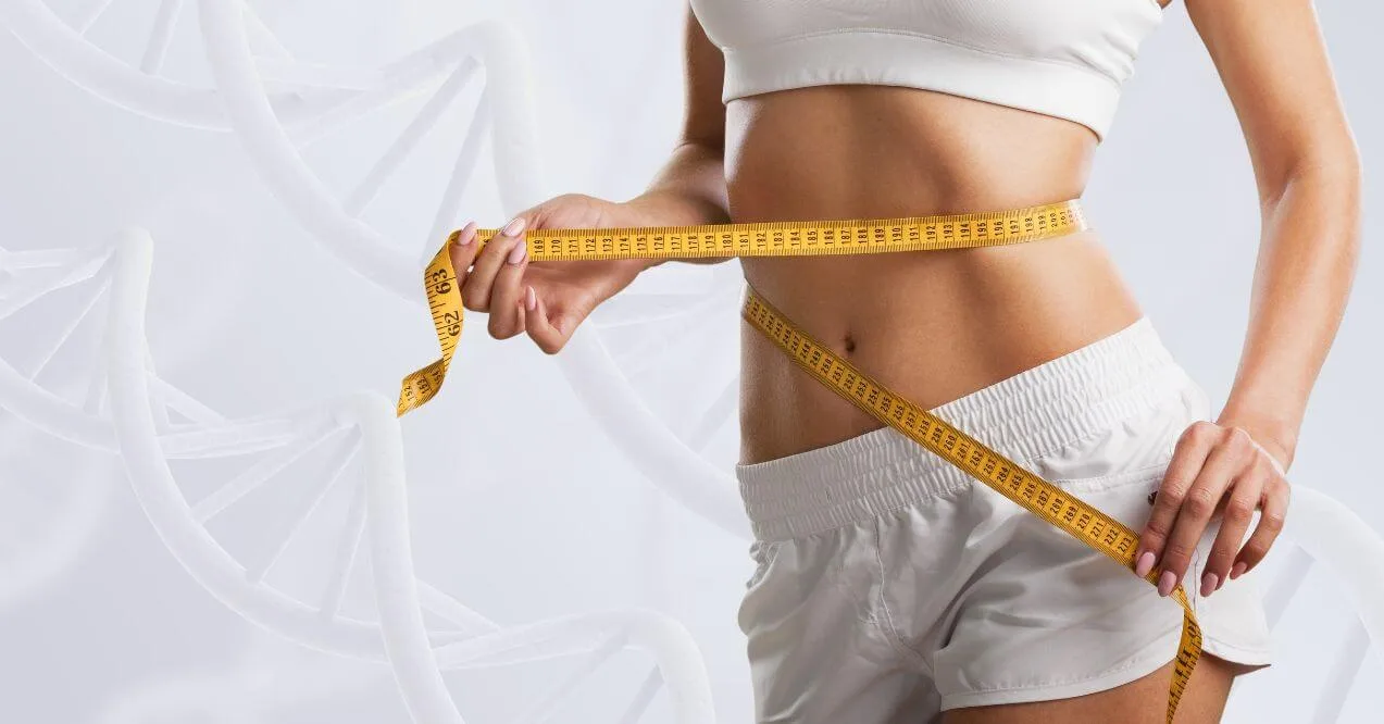 Woman measuring waist for fast metabolism.