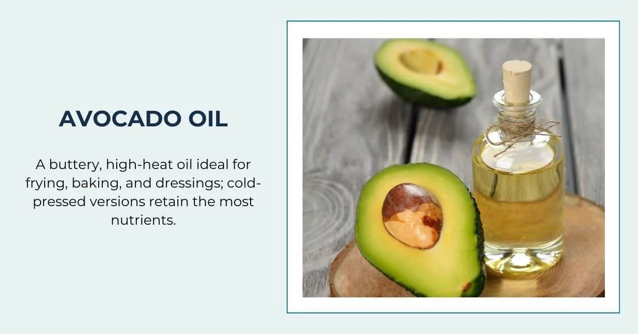 A bottle of avocado oil with a halved avocado on a rustic wooden surface.