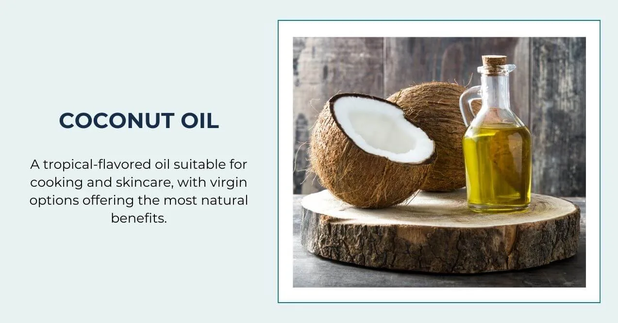 A bottle of coconut oil with a halved coconut on a wooden board.