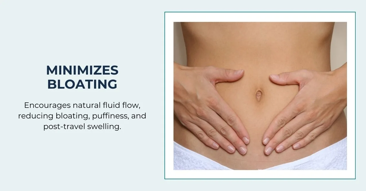 Person gently massaging their stomach to reduce bloating.