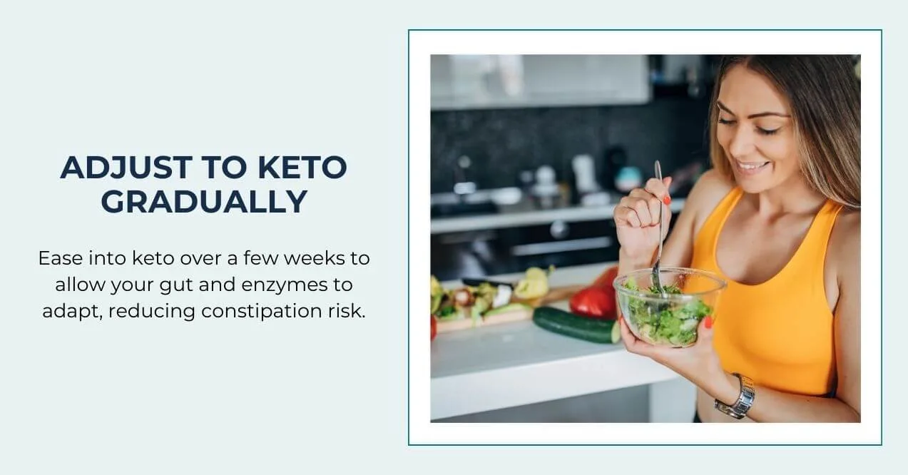 Woman smiling while eating salad in kitchen with fresh veggies nearby