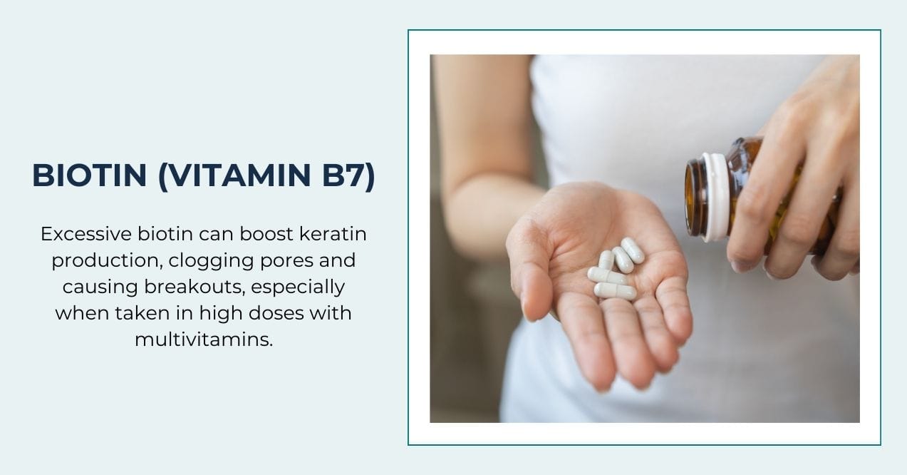 Person holding white capsules from supplement bottle