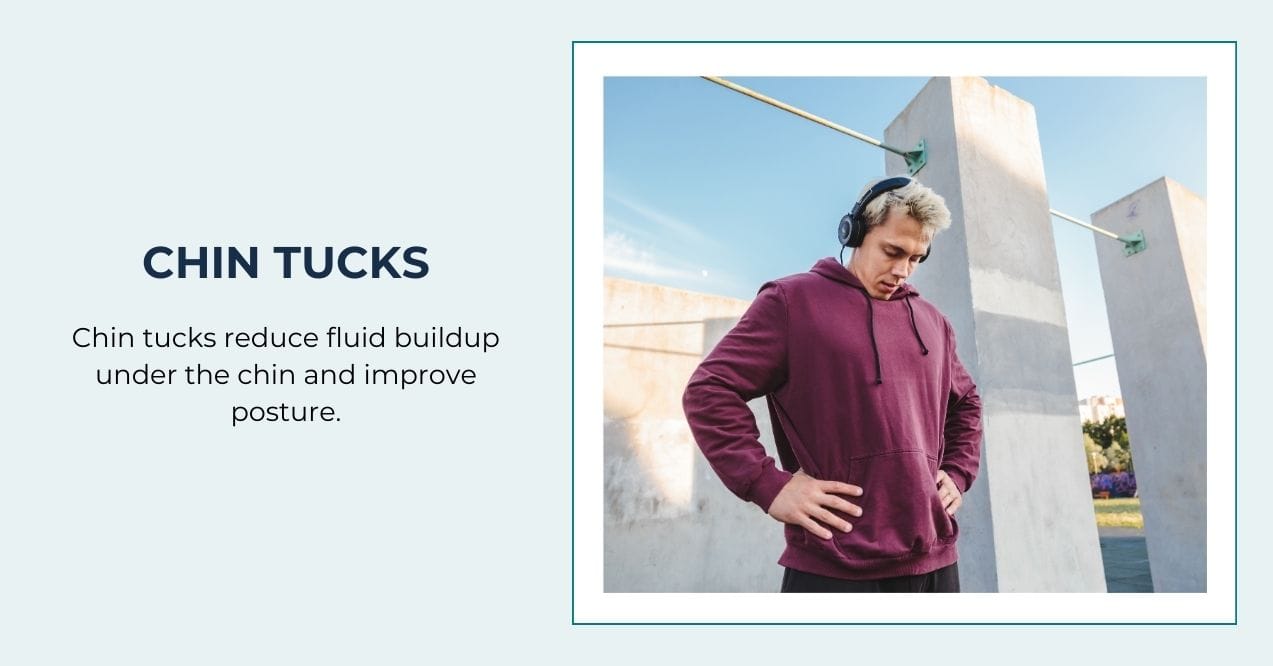 Man in a hoodie doing chin tuck exercise outdoors with headphones on.