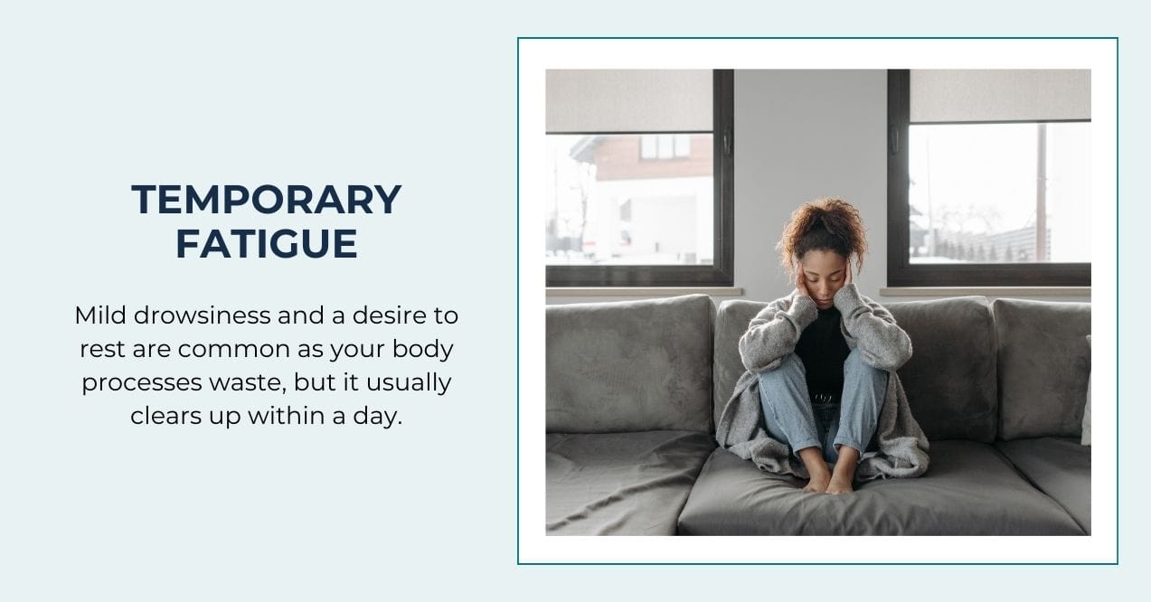 Woman resting on a couch, representing temporary fatigue after lymphatic massage.