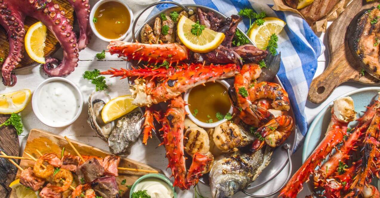 Variety of seafood dishes resembling the topic does seafood make you sleepy