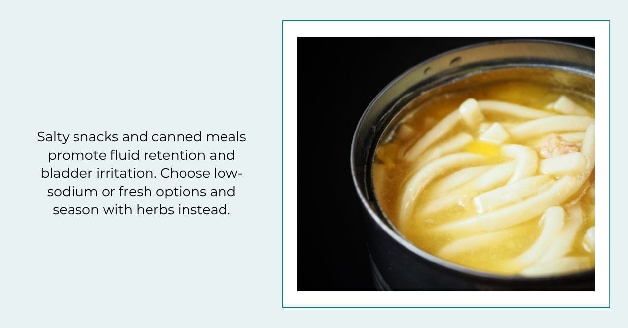 Open can of soup with noodles in broth