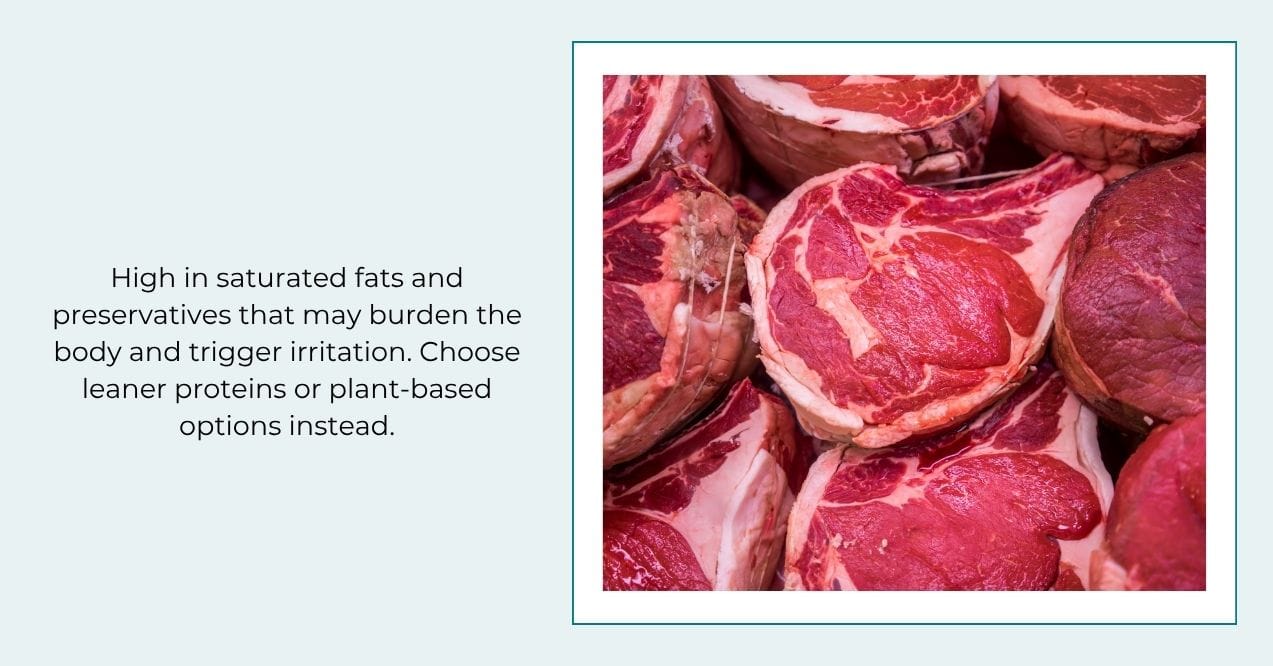 Close-up of raw marbled steaks in a butcher case