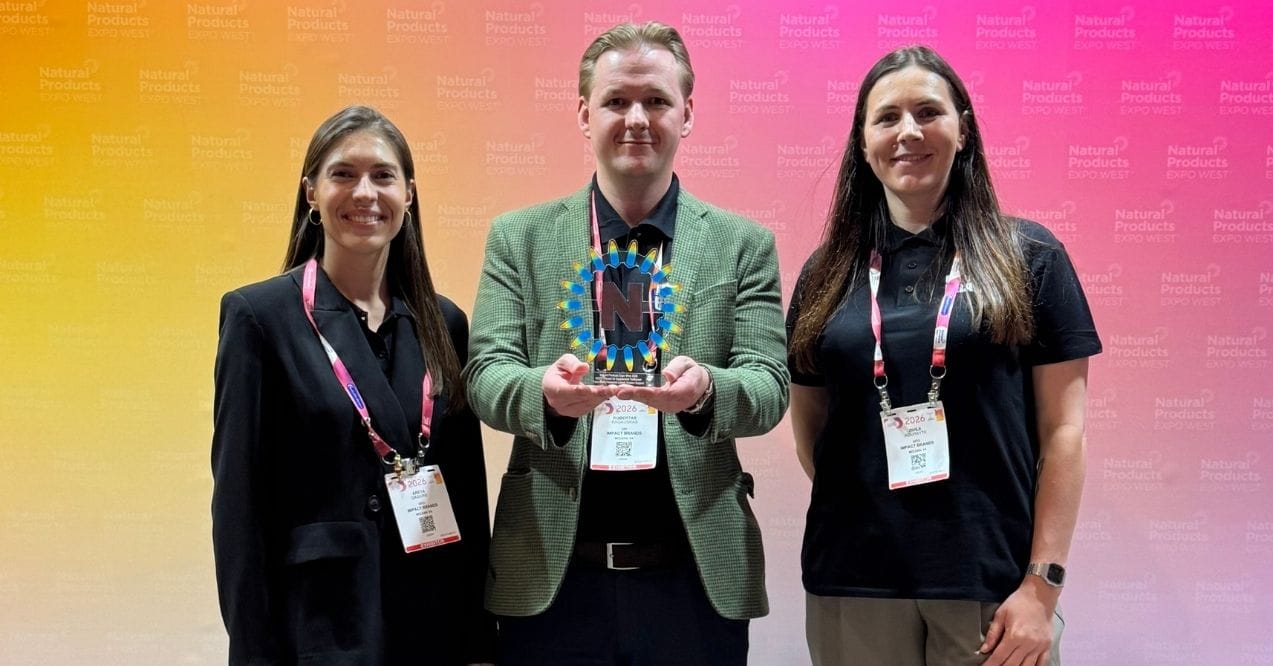 PureHealth Research representatives holding NEXTY award