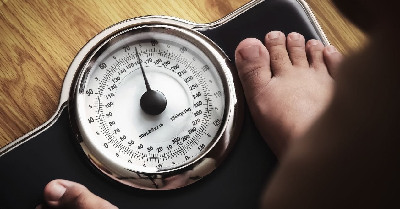 Close-up of feet on a bathroom scale
