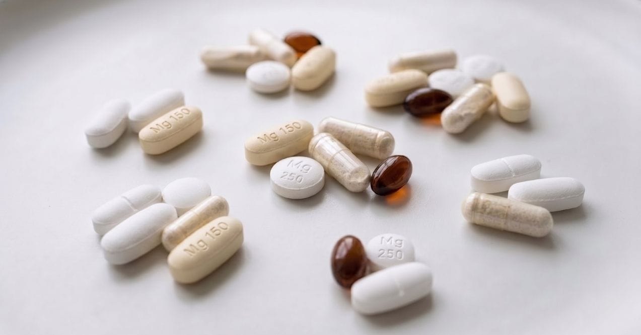 Different magnesium tablets and capsules arranged